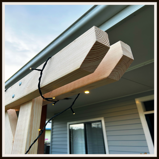 Close up of wedding arbor / garden arbor beams
